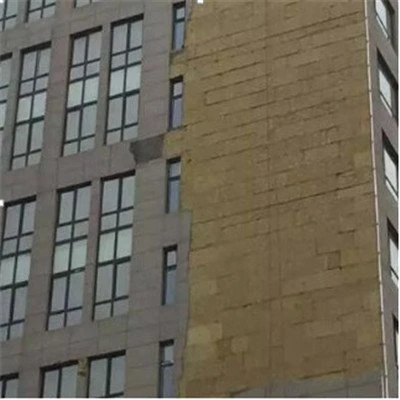 Wall with traditional insulation board